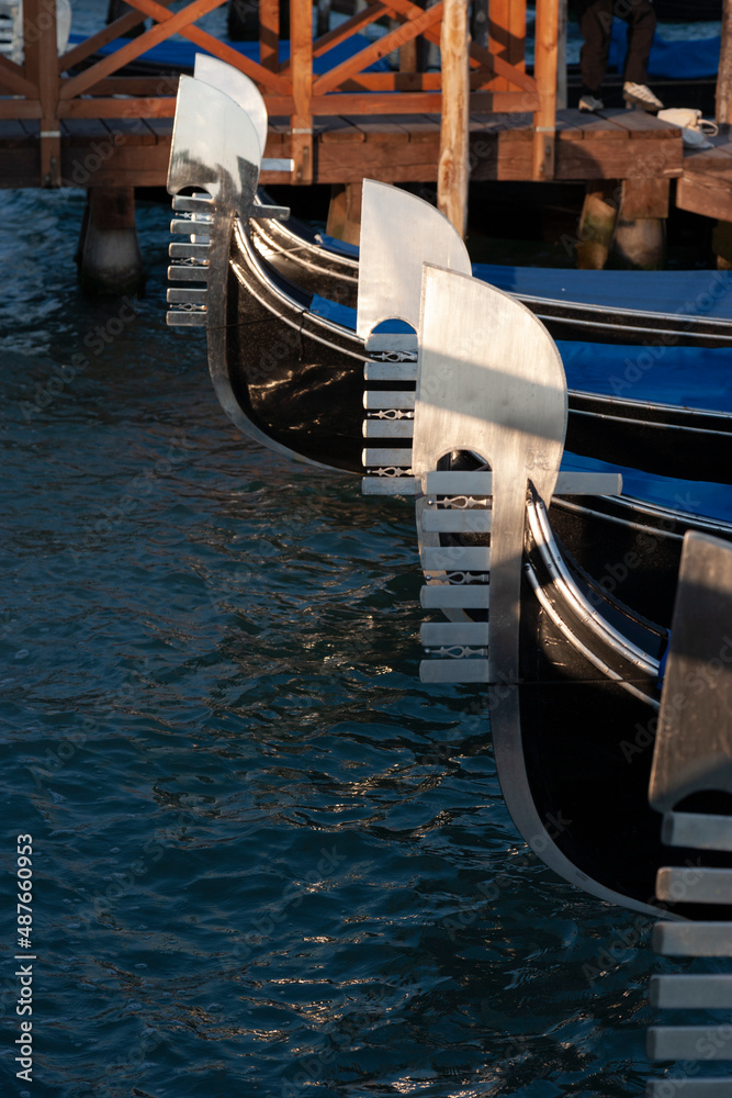Moored gondolas in a canal, Venice, Italy