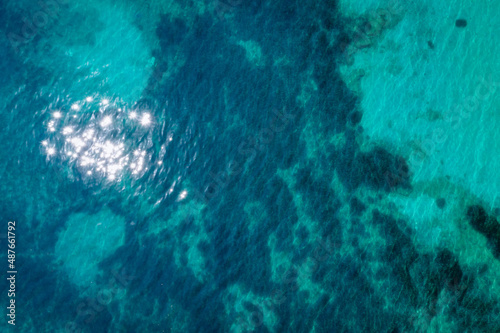 Surface of Ionian Sea, drone photo made in Benitses village in eastern part of Corfu Island in Greece