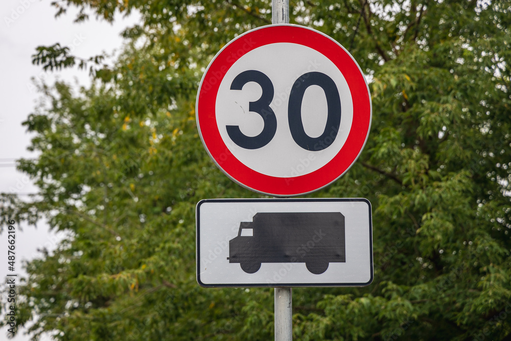 30 kph speed limit sign for trucks in Warsaw city, Poland