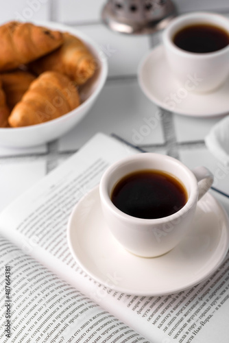 coffee and croissants  chocolate cream  french press on the table  morning breakfast 