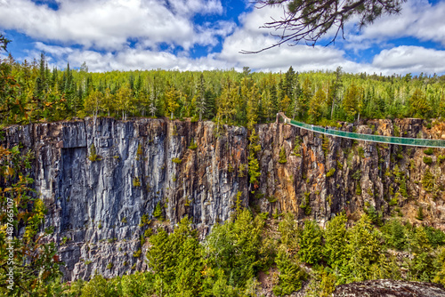 Tall rock face rising 300 feet above ground at the Canyon - Thunder Bay, Ontario, Canada photo