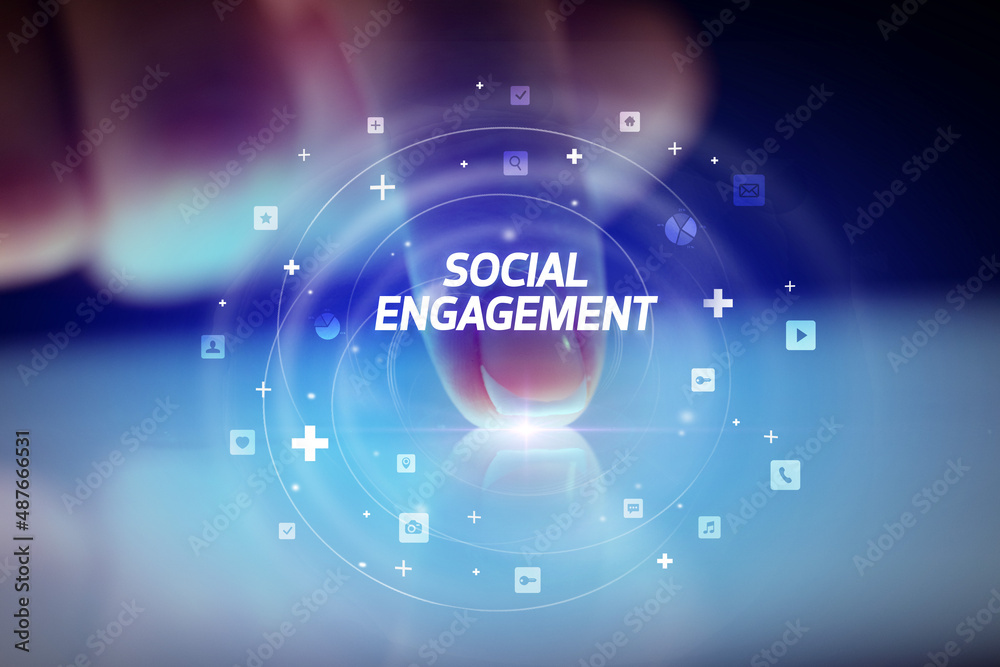 Finger touching tablet with social media icons concept Finger touching tablet with social media icons concept