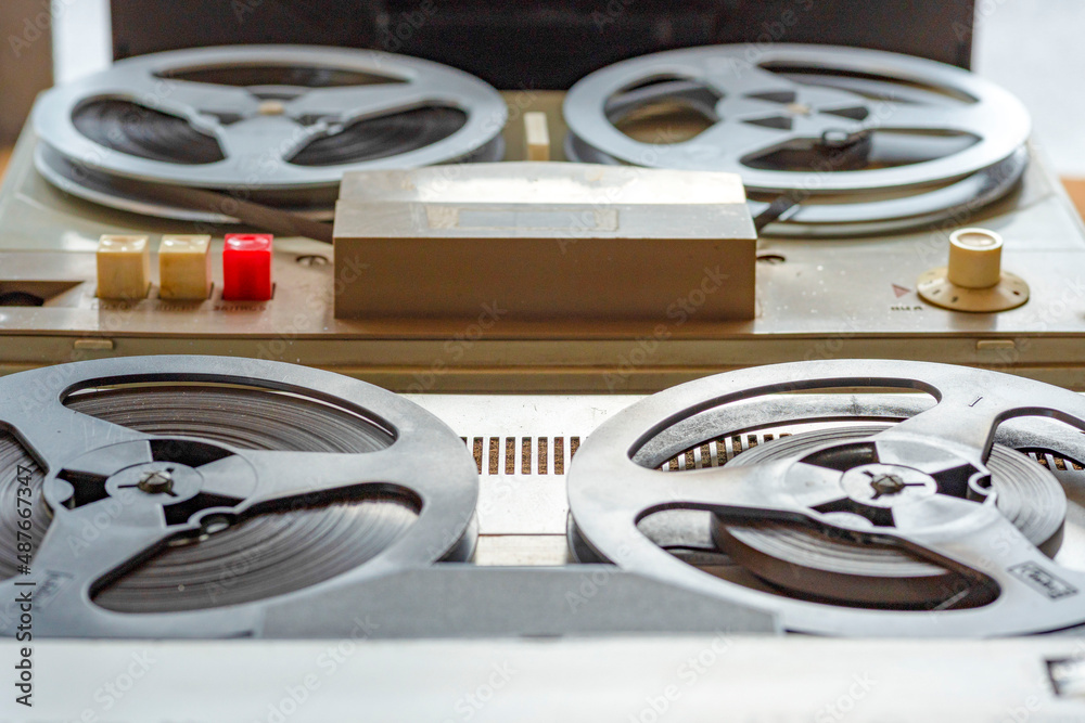 Old vintage player of reels. The antique ReeltoReel. Tape Recorder