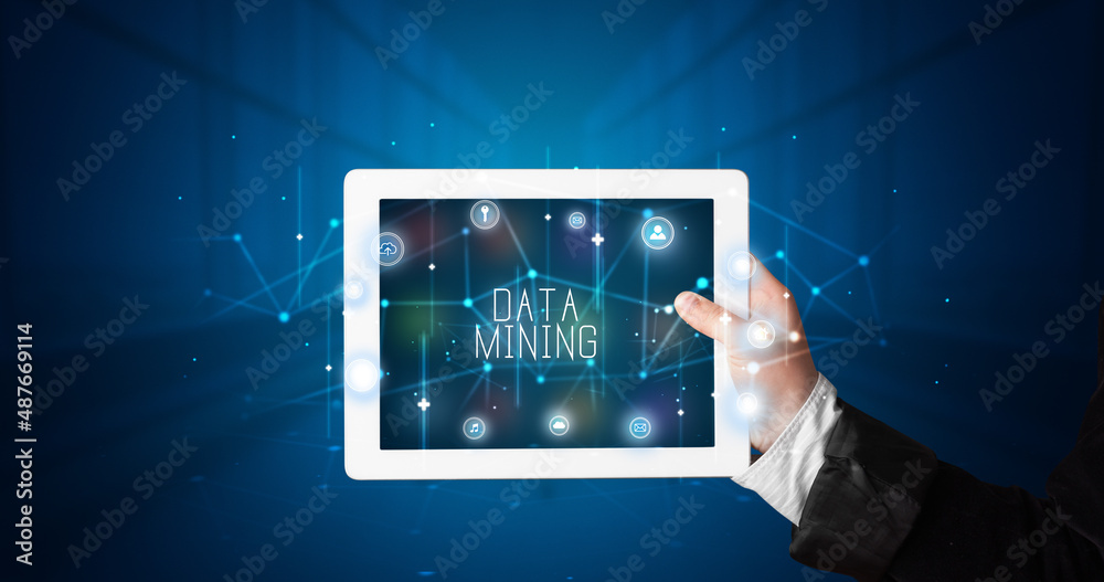 Person holding tablet, security concept Person holding tablet, security concept