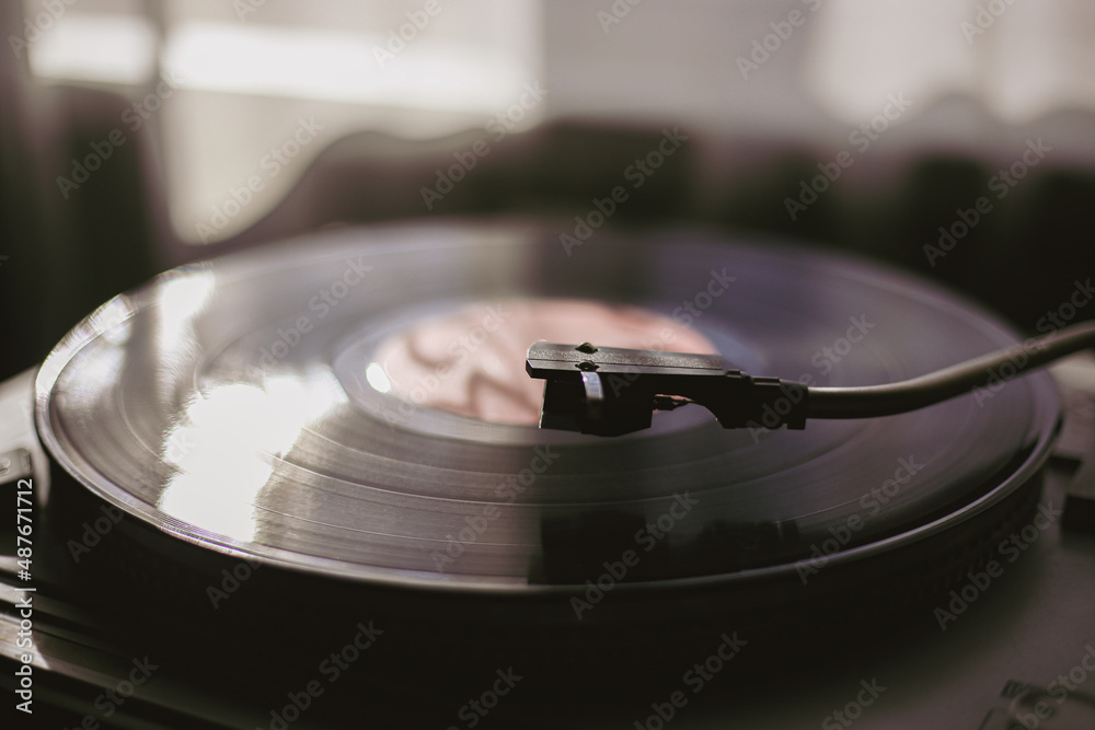 Playing classic vinyl records in daylight close-up Playing classic vinyl records in daylight close-up