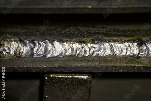 Unsightly fillet weld on a metal profile.