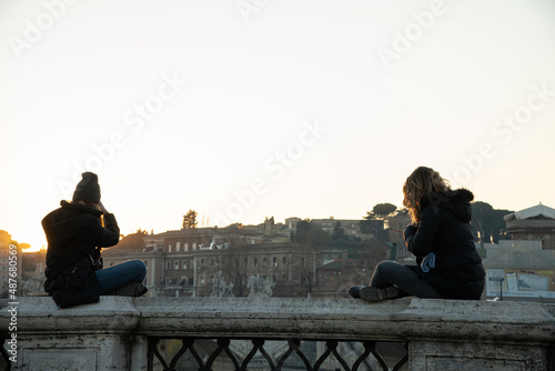 Photography young girls enjoying view of rome