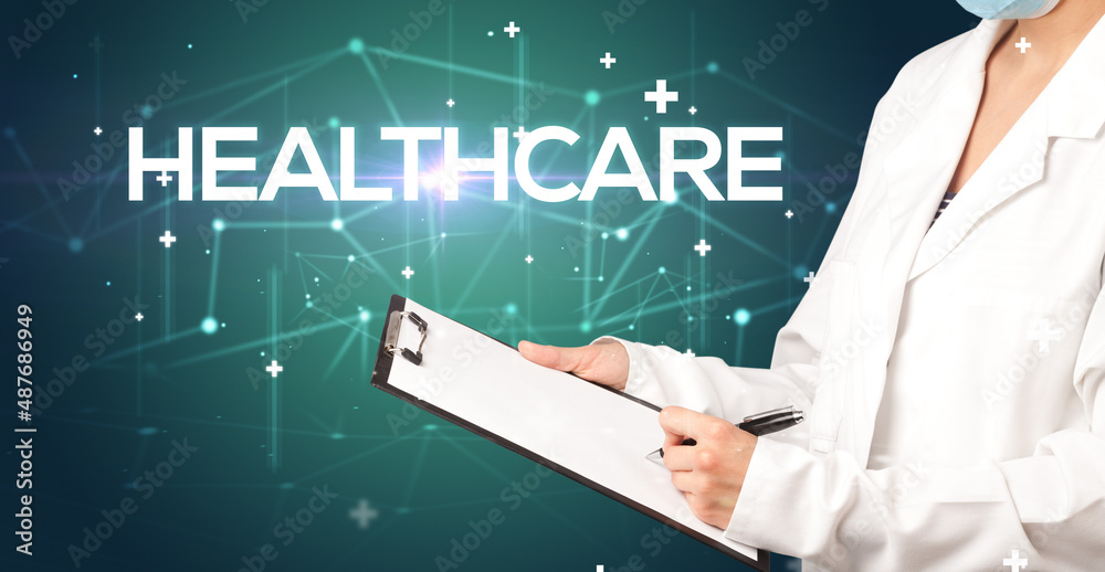 Doctor fills out medical record