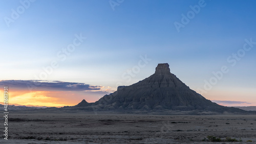 Majestic Factory butte in Utah against Sunset sky .