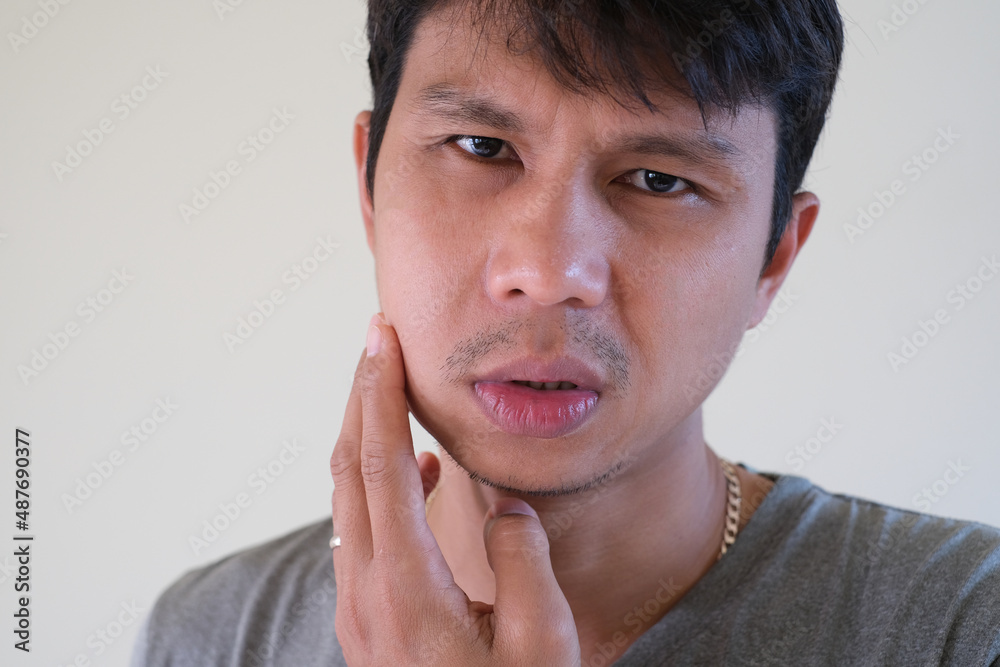 Teetch problem. Asian male with painful cheek swelling or dental