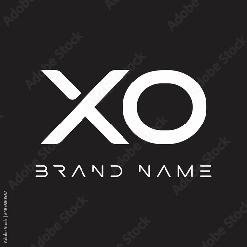the letters X and O. Minimalistic design letter logo on black background