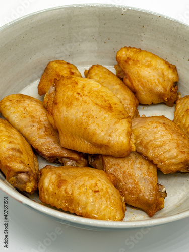 A plate of roast chicken wings