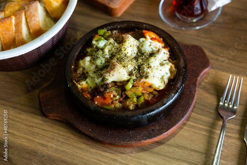 Popular flavorful hot dish in a pot of poultry and vegetables Saute in Turkish (Et Sote).
