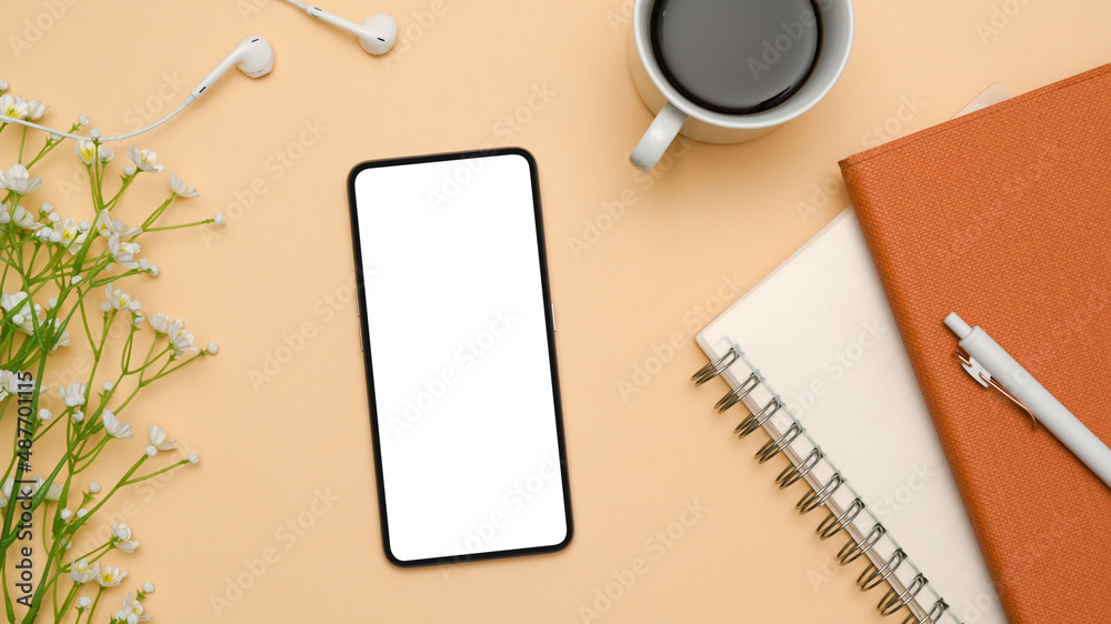 Female office desk top view, flat lay with smartphone mockup Female office desk top view, flat lay with smartphone mockup