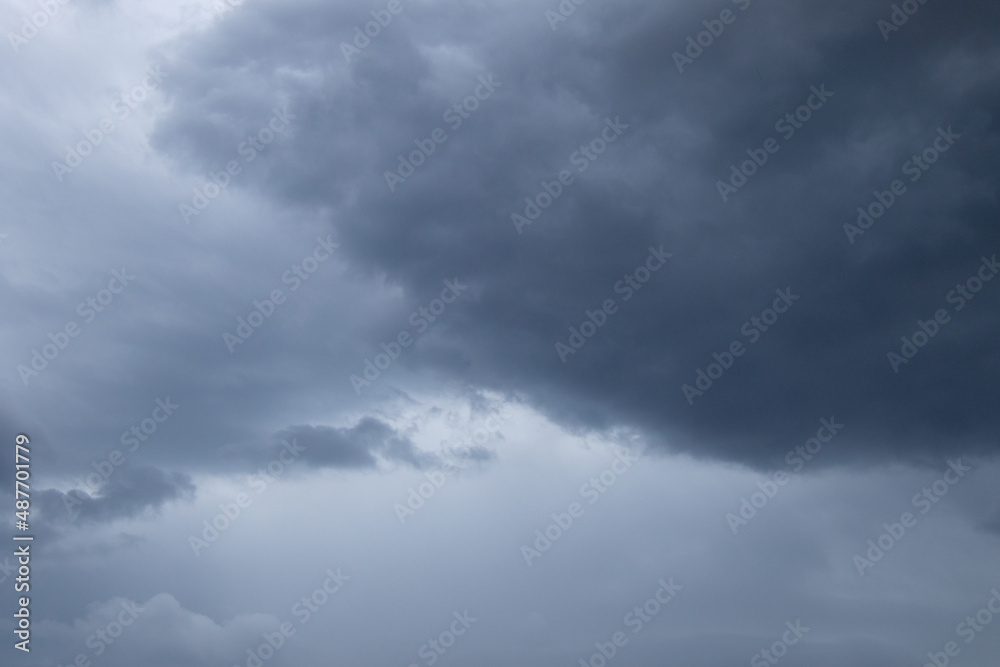 Fototapeta premium Dark clouds gathered in the sky prior to a summer rainstorm