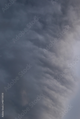 Canvas Print Dark clouds gathered in the sky prior to a summer rainstorm