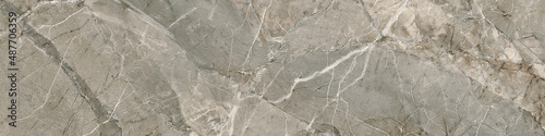brownish grey natural marble stone structure with scattered veins for tiles backgroun photo