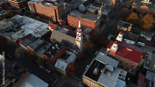 Churches of Frederick City, Western Maryland USA. Aerial View of Church Street and Downtown Neighborhood on Golden Hour Sunlight, Drone Shot photo