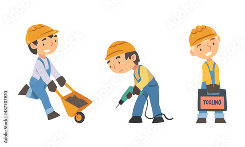 Boy builders in overalls and hard hat with construction tools set cartoon vector illustration