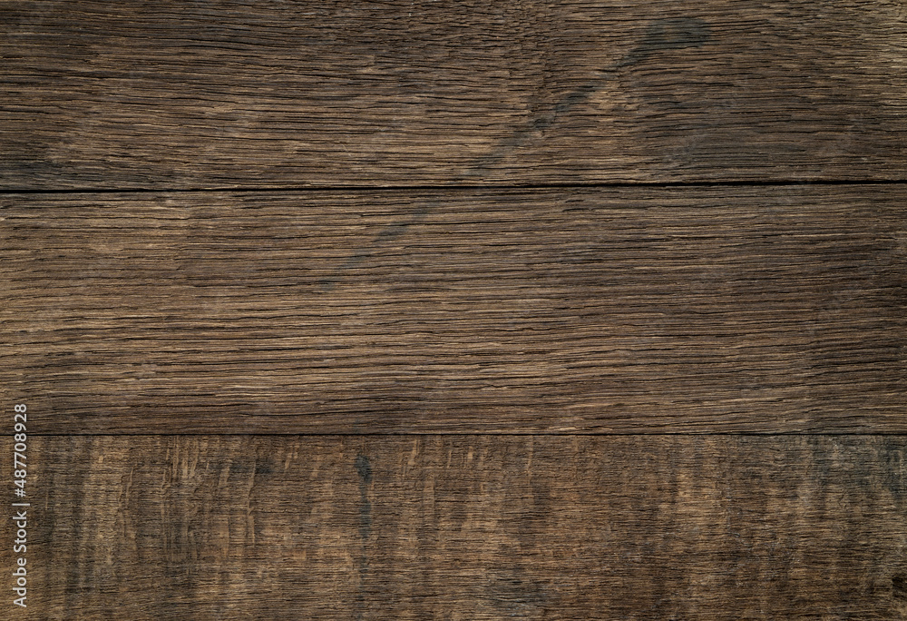 Old grunge dark textured oak wood background, brown wood texture surface.