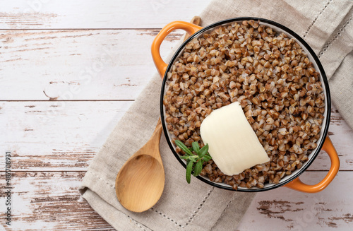 Boiled buckwheat porridge in a pot.Natural organic buckwheat cereal.