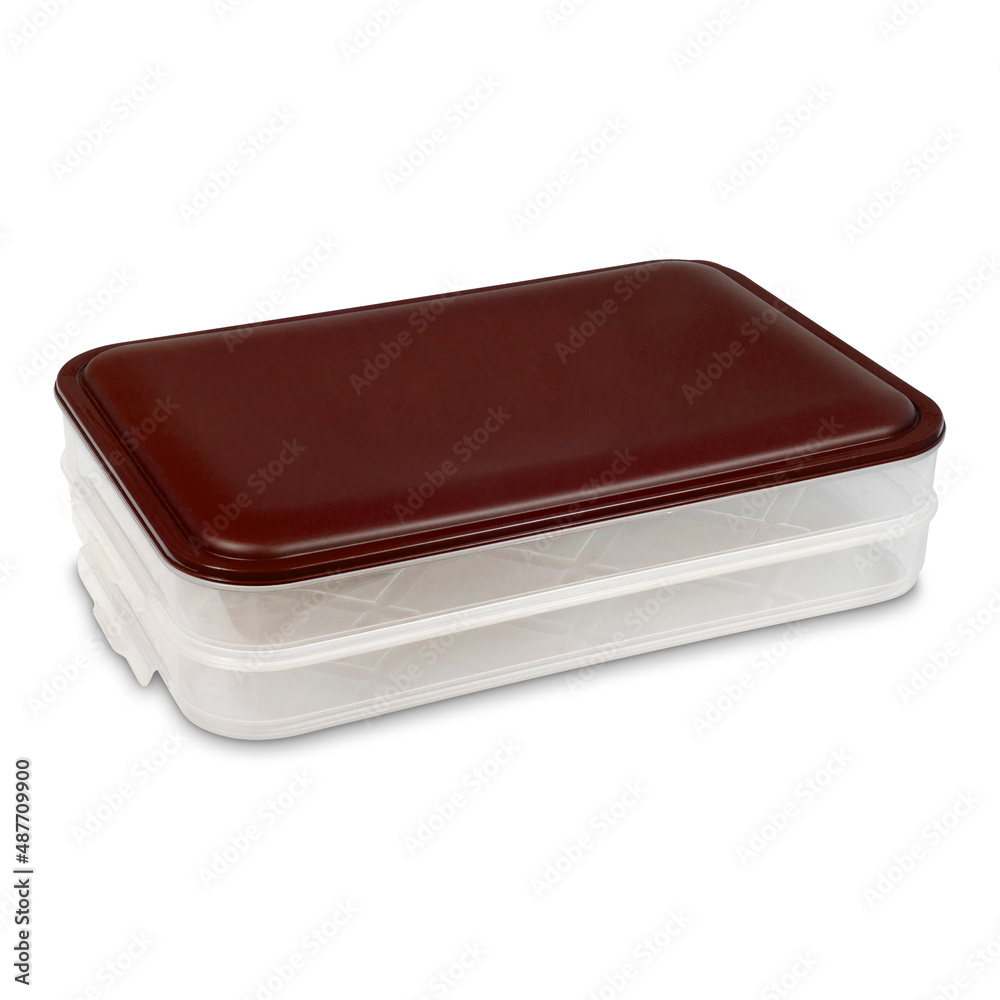 Plastic food storage container with closed brown lid isolated on white background Plastic food storage container with closed brown lid isolated on white background