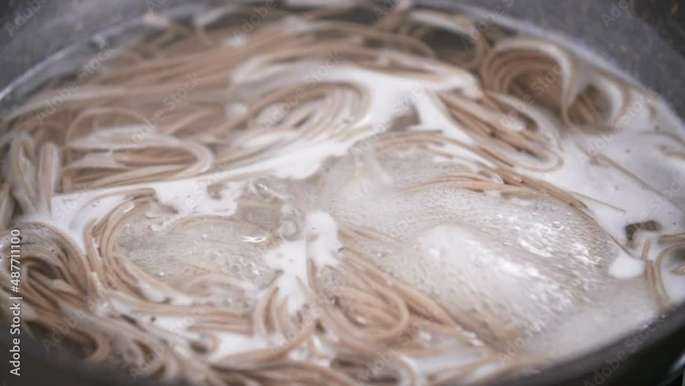 Boiling Healthy Japanese Buckwheat Soba Noodles, Close Up, Making Zaru Soba Boiling Healthy Japanese Buckwheat Soba Noodles, Close Up, Making Zaru Soba