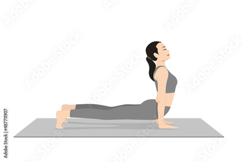 Upward Facing Dog Toes Tucked. Beautiful girl practice Urdhva Mukha Svanasana Toes Tucked. Young attractive woman practicing yoga exercise. working out, black wearing sportswear, grey pants and top