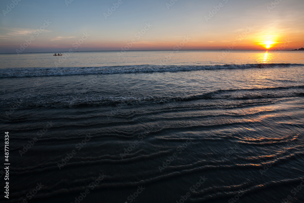 Sunset on the Payarm Island beach in Ranong Province, Southern Thailand