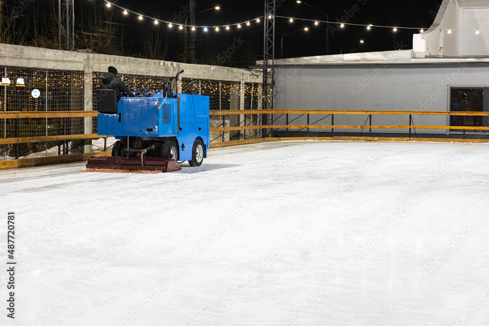 Fototapeta premium machine levels the ice after skating