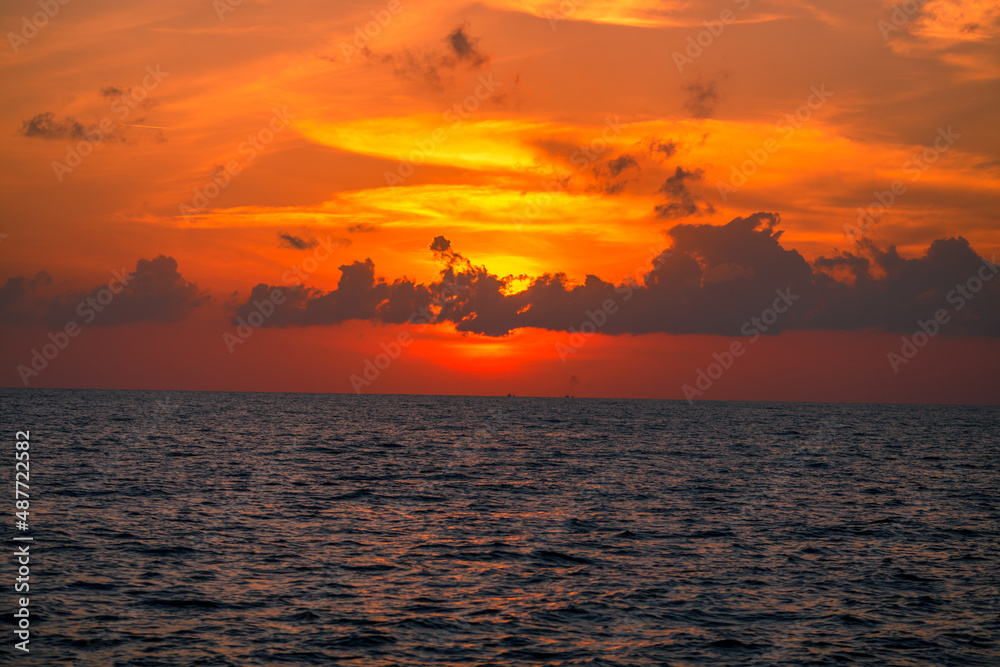 The background of the sea by the evening sea, with natural beauty (sea water, rocks, sky) and fishermen are fishing by the river bank, is a pleasure during travel. The background of the sea by the evening sea, with natural beauty (sea water, rocks, sky) and fishermen are fishing by the river bank, is a pleasure during travel.