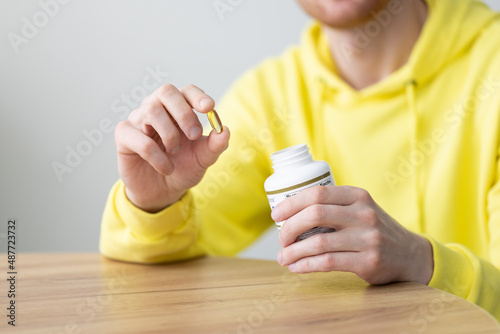 Man takes pills. Healthcare and medicine concept.