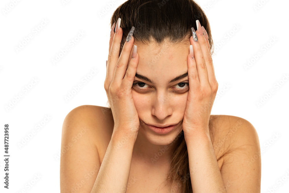 young woman full of boredom leaned her head on her hand young woman full of boredom leaned her head on her hand