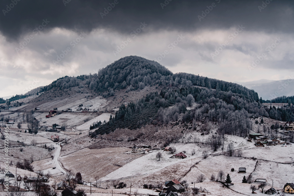 Moody winter landscape in Bucegi Mountains, Romania