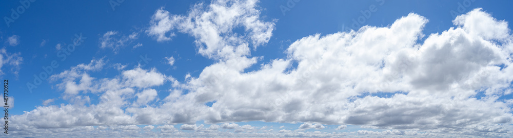Beautiful view of blue sky with clouds at sunrise. Partly cloudy. Colorful sunset. Natural sky background texture, beautiful color. Beautiful view of blue sky with clouds at sunrise. Partly cloudy. Colorful sunset. Natural sky background texture, beautiful color.