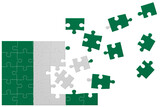 Broken puzzle- game background in colors of national flag. Nigeria