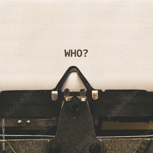 Question Who, headline text written on vintage type writer from 1920s