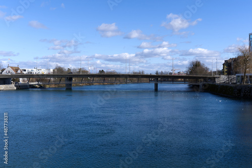 River Aare at City of Solothurn with Rötibrücke (Röti Bridge) in the background on a sunny winter day. Photo taken February 7th, 2022, Zurich, Switzerland. © Michael Derrer Fuchs