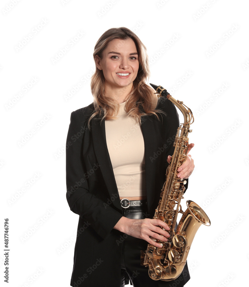 Fototapeta premium Beautiful young woman in elegant suit with saxophone on white background
