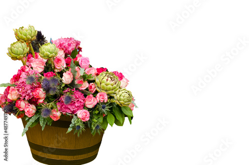 Fototapeta Naklejka Na Ścianę i Meble -  bouquet of flowers in a wooden bucket