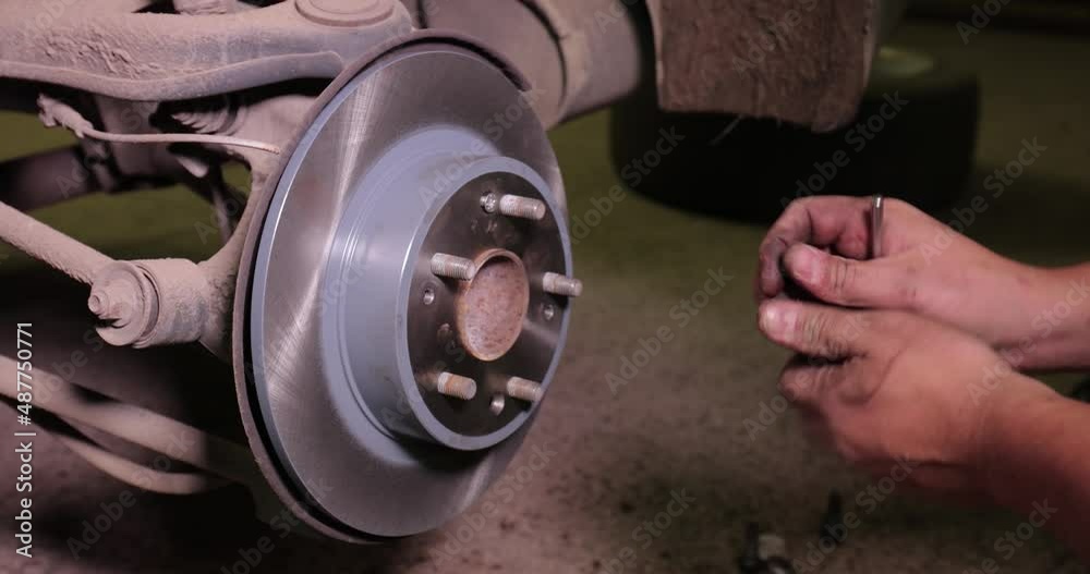 Changing brake rotor disc on a car Changing brake rotor disc on a car