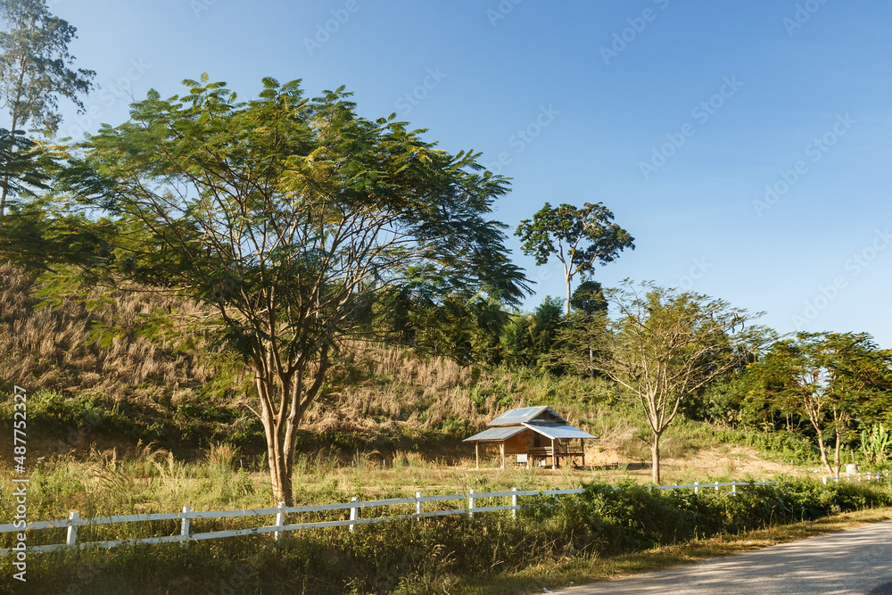 Wooden house near the road in Laos. Sainyabuli Province Wooden house near the road in Laos. Sainyabuli Province