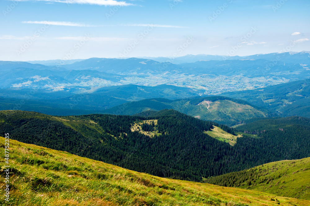 view of the morning mountains in the blue fog, the conquest of Mount Hoverla, the Carpathians. High quality photo