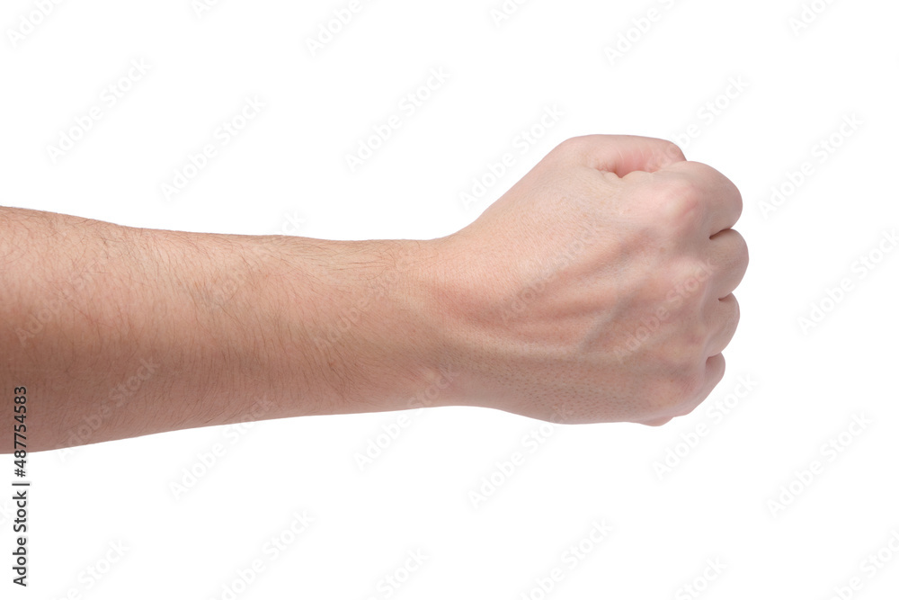 Man hand is launched into fist, isolated white background. Man hand is launched into fist, isolated white background.