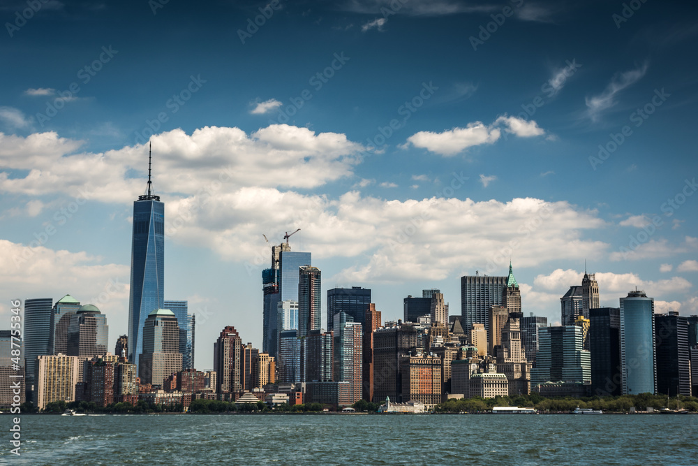 Fototapeta premium New York,NY USA august 09 2016 panoramic photo of new york in color with sailboat Manhattan