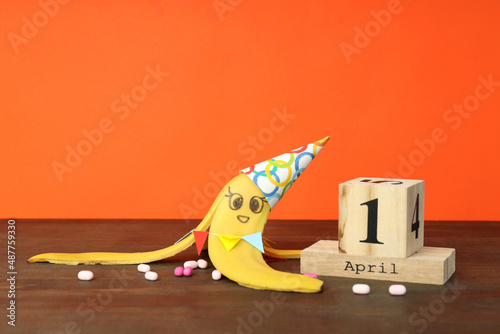 Obraz na płótnie Concept of April Fool's Day on wooden table