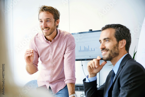 Two businessmen in a meeting