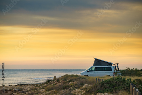 Canvas-taulu Van camper with tent on roof top camp on nature