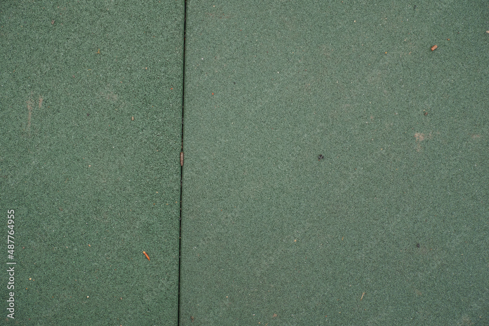 dark green EPDM synthetic rubber pavement with vertical joint