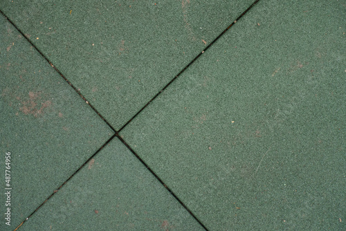 Dirty surface of dark green EPDM synthetic rubber floor